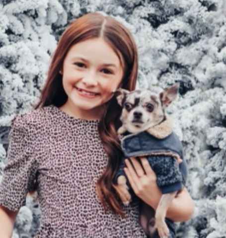 Cailey Fleming with her pet dog Baxter.